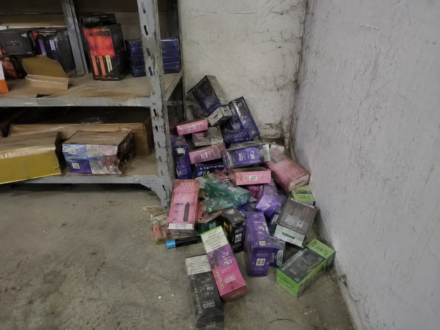 Inventory Risk from Shipping Delays A pile of dusty, outdated electronic product boxes