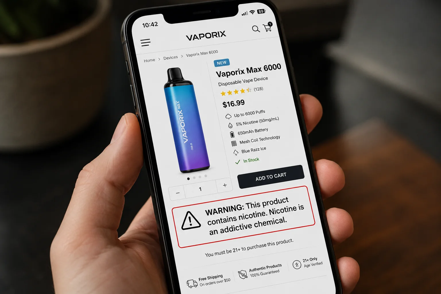 Correct Nicotine Warning Placement A mobile phone screen showing a vape product page with the nicotine warning prominently displayed