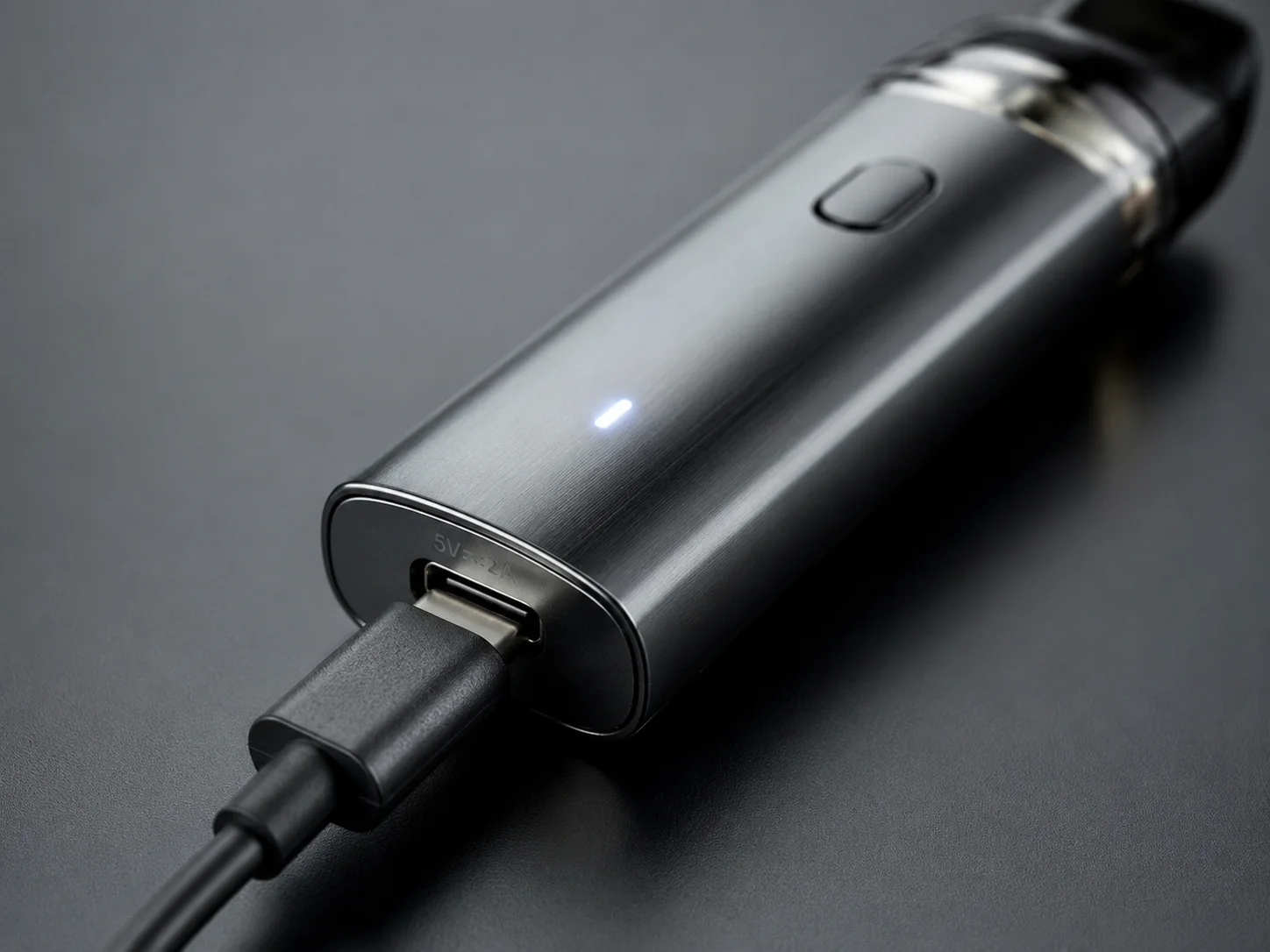A vape being recharged via a USB-C cable