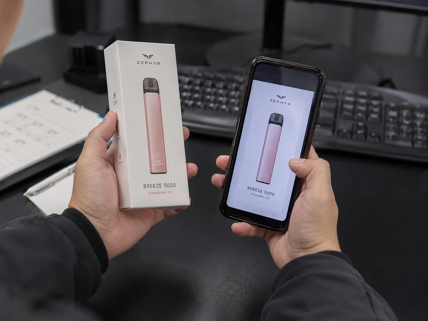 Comparing a vape box to an image on a smartphone
