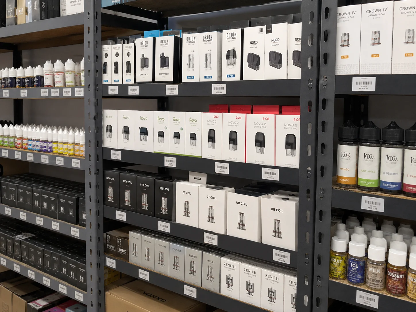 Shelves stocked with replacement pods, coils, and e-liquid bottles