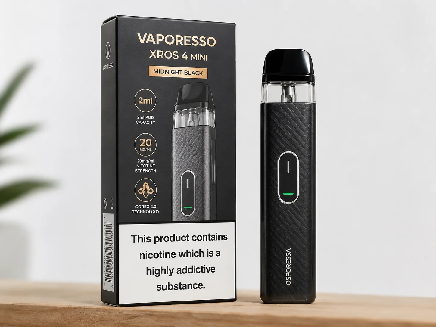 A close-up of a TPD-compliant vape package with warning labels and capacity info